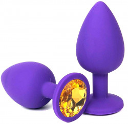 Фиолетовая анальная пробка с оранжевым стразом - 6,8 см. Фиолетовая анальная пробка с оранжевым стразом - 6,8 см.