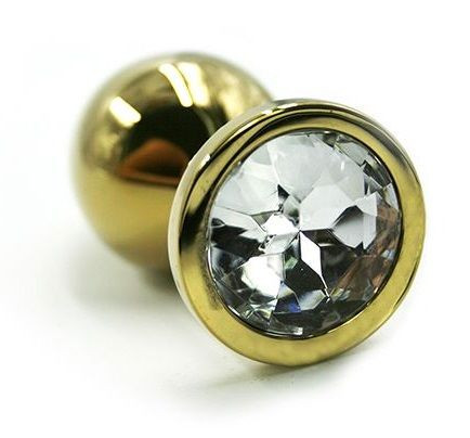Золотистая алюминиевая анальная пробка с прозрачным кристаллом - 7 см. Золотистая алюминиевая анальная пробка с прозрачным кристаллом - 7 см.