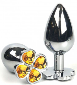 Серебристая анальная втулка с клевером из оранжевых кристаллов - 9 см.