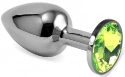 Серебристая гладкая анальная пробка с салатовым кристаллом - 8 см.